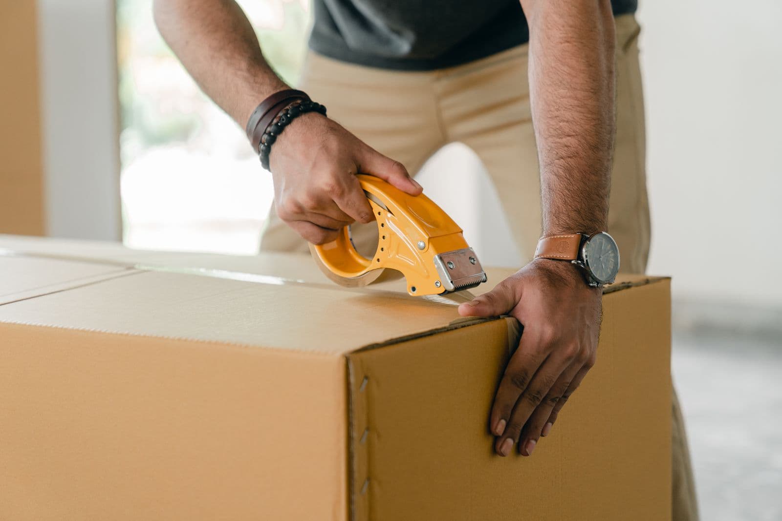Moving boxes in a home ready for a move-out clean